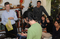 Dr. Nicholas Hellmuth and FLAAR staff in a holiday season social activity